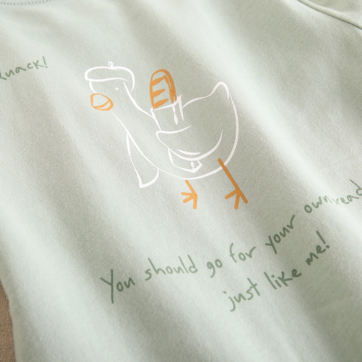 Sweat motif au dos