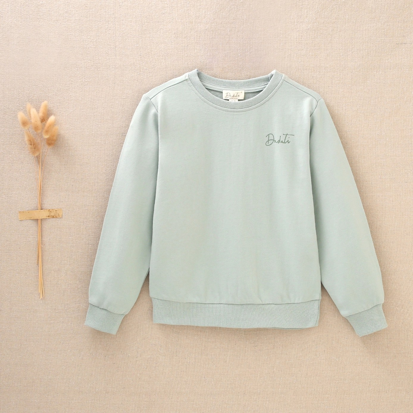Sweat motif au dos